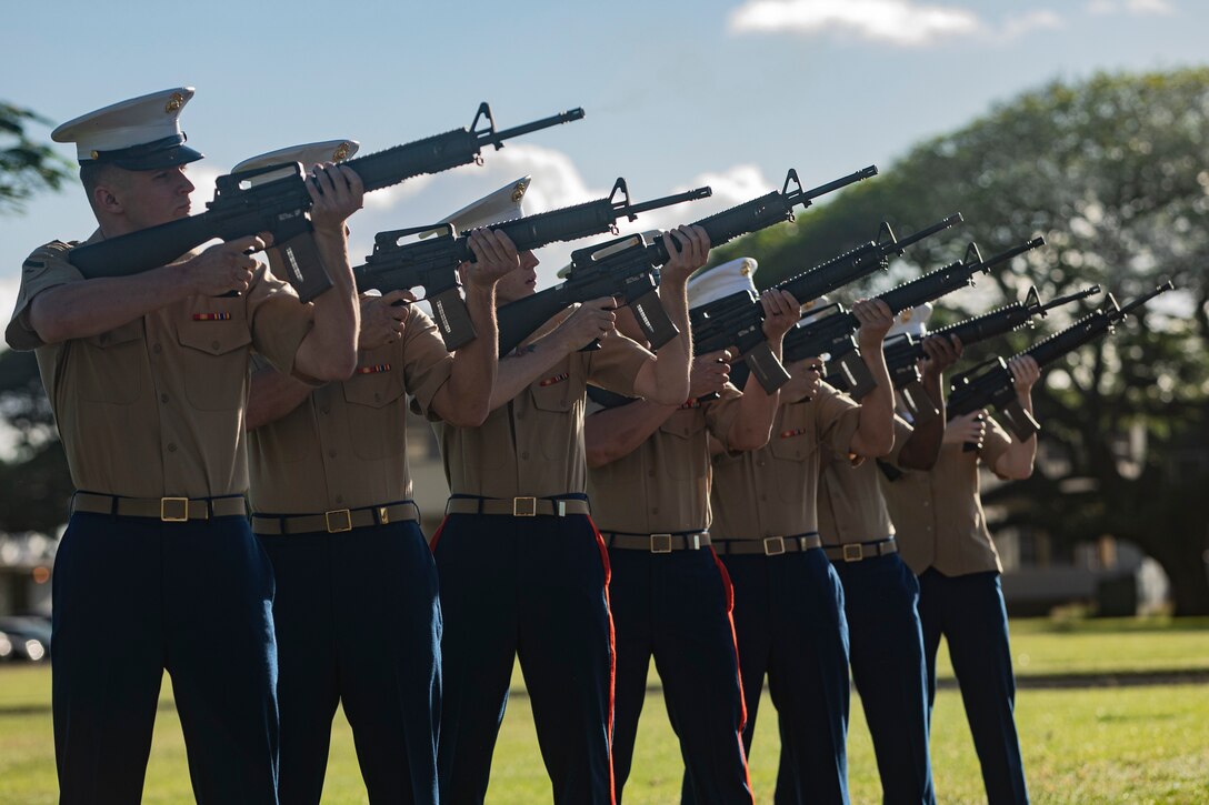 U.S. Marines with the rifle detail for the annual Klipper Ceremony perform the traditional 21-gun salute for those who gave their lives on Dec. 7, 1941, Marine Corps Base Hawaii, Dec. 7, 2019. The Klipper Memorial was dedicated in 1981 to honor the 17 U.S. Navy Sailors and two civilian contractors who died during the attack on Naval Air Station Kaneohe Bay on Dec. 7, 1941.