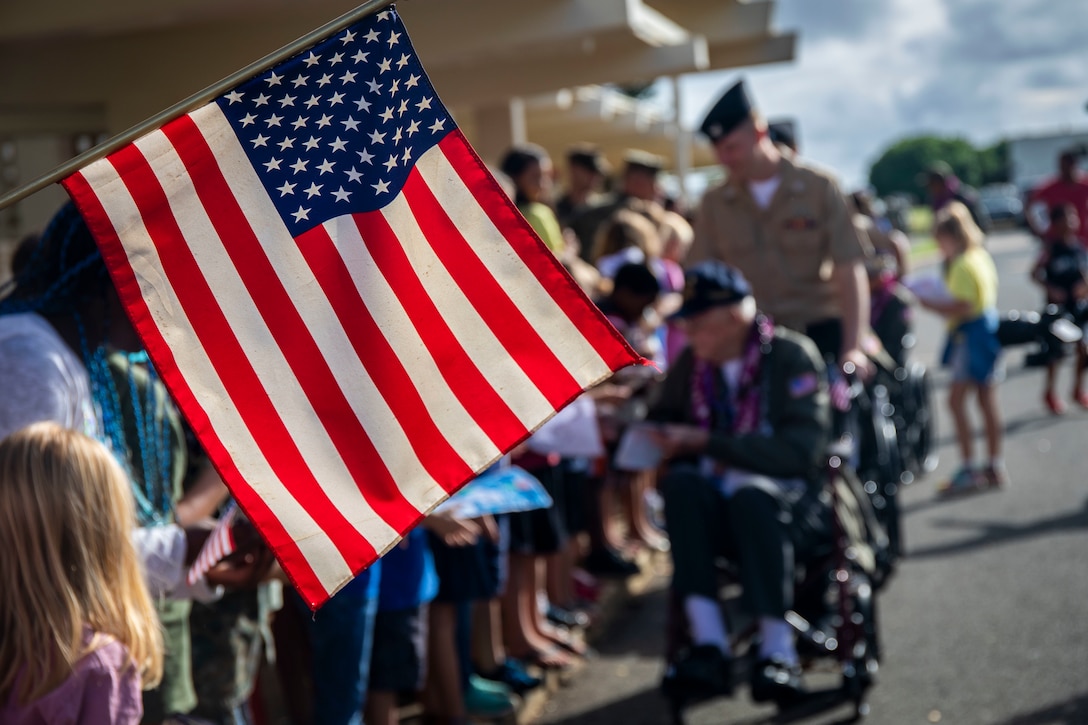 An American flag is displayed during a U.S. Navy veterans visit to Marine Corps Base Hawaii, Dec. 5, 2019. The Best Defense Foundation returned 6 WWII Pearl Harbor and Naval Air Station Kaneohe Bay survivors to Hawaii for the 78th Commemoration of Pearl Harbor and Naval Air Station Kaneohe Bay which is now MCBH. The heroes returned were Jack Holder US NAVY - Naval Air Station, Kaneohe Bay; Tom Foreman US Navy - USS Cushing; Ira Schab US Navy - USS Dobbin; Stuart Hedley US Navy - USS West Virginia; Donald Long US Navy - Naval Air Station, Kaneohe Bay; and Chuck Kohler US Navy - USS Hornet.
