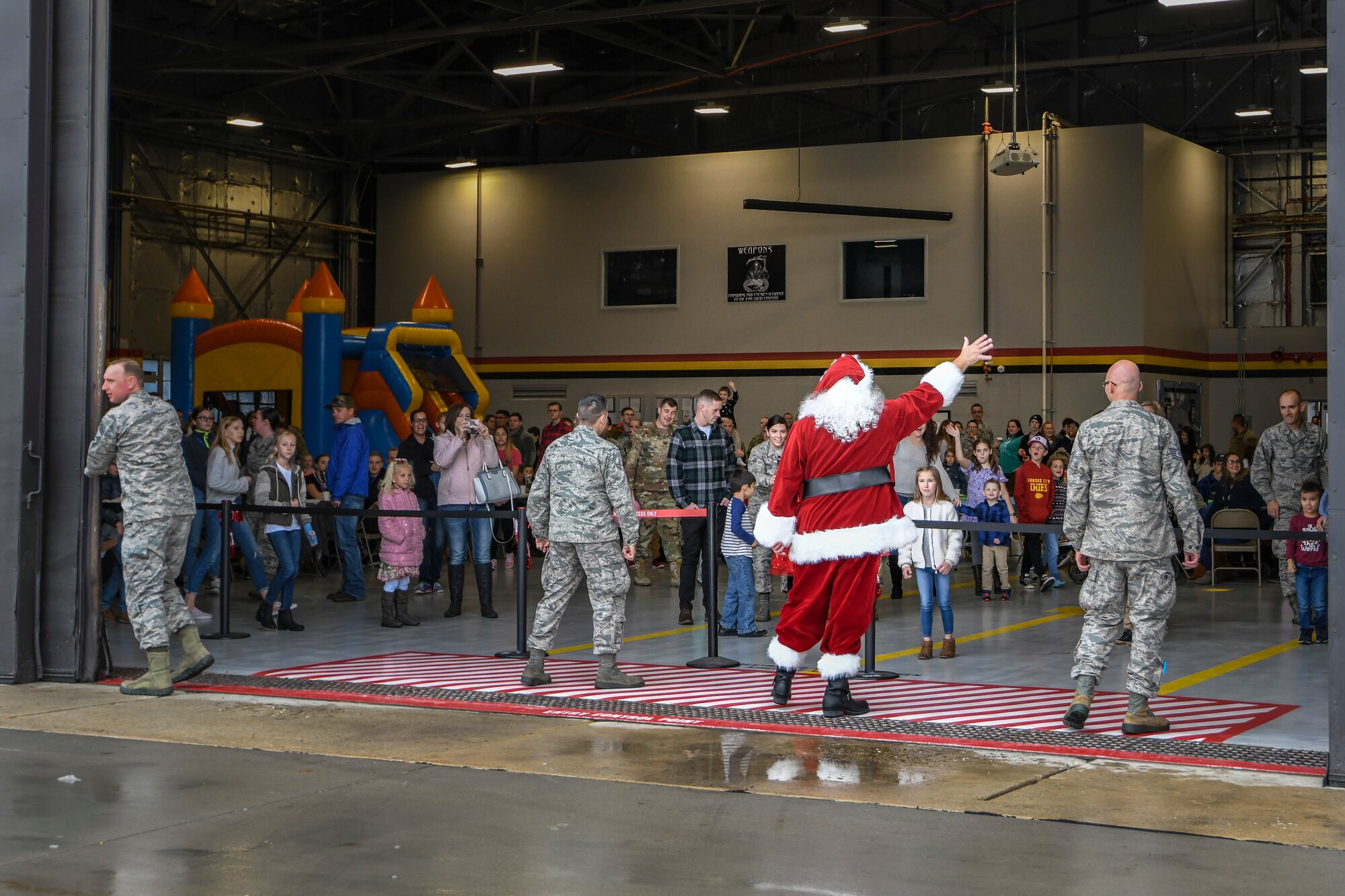 Santa waves to members of the 419th Fighter Wing and their families after “arriving" in an F-35 Lightning II