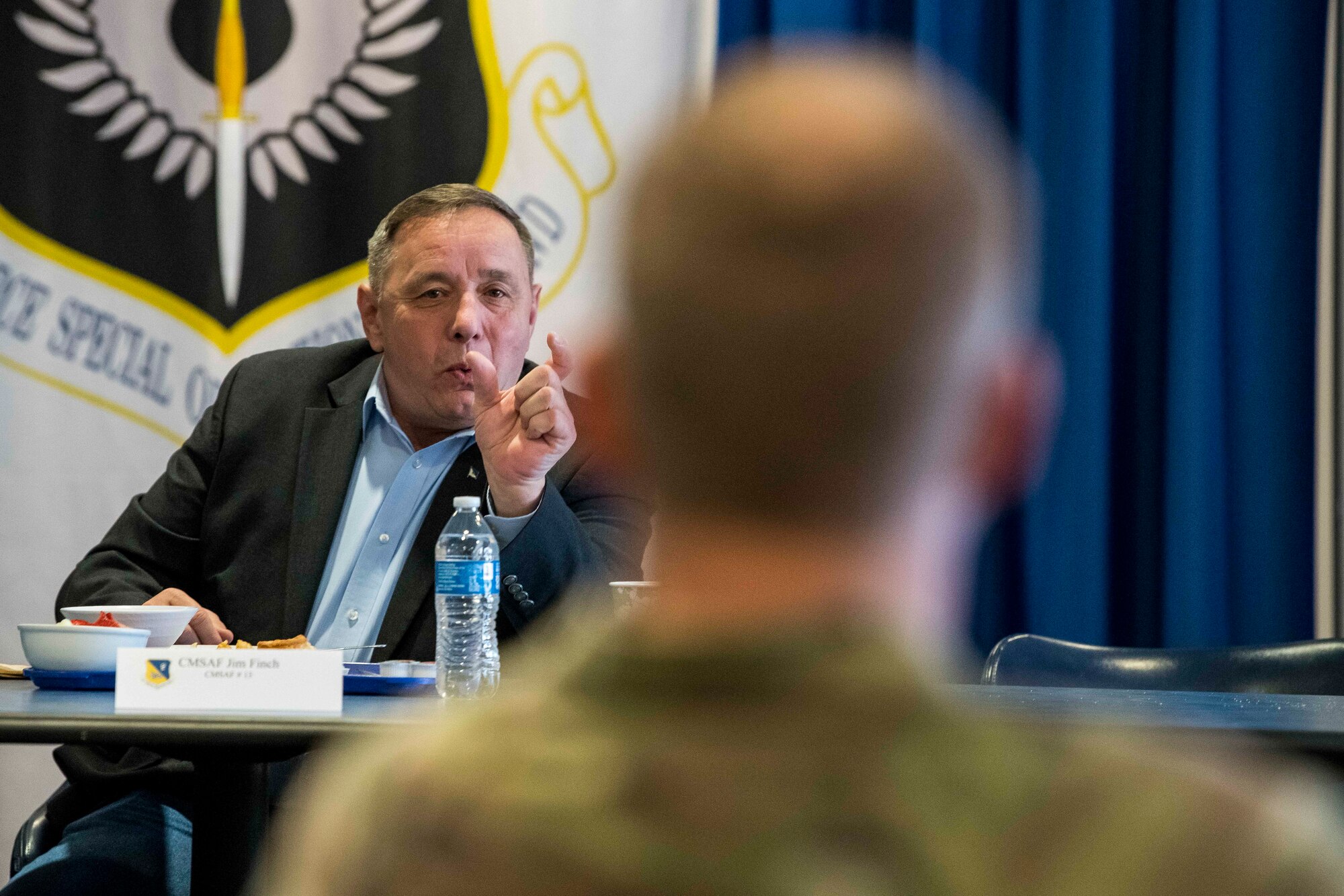 Retired Chief Master Sgt. of the Air Force Jim Finch answers a question during a breakfast with senior leadership at Cannon Air Force Base, N.M., Dec. 5, 2019. The 12th and 13th Chief Master Sgts. of the Air Force visited Cannon to share their stories with Air Commandos.  (U.S. Air Force photo Senior Airman Vernon R. Walter)