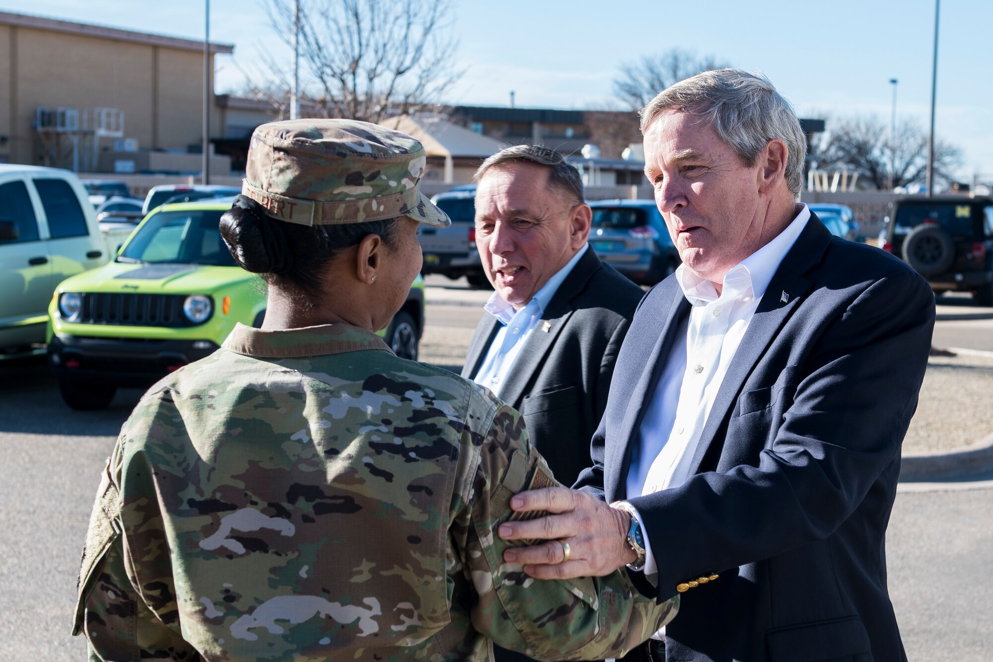 Retired Chief Master Sgts. of the Air Force Eric W. Benken and Jim Finch meet with Master Sgt. Dawana Tolbert, 27th Special Operations Force Support Squadron Airman Leadership School commandant, at Cannon Air Force Base, N.M., Dec. 5, 2019. The 12th and 13th Chief Master Sgts. of the Air Force visited Cannon to share their stories with Air Commandos. (U.S. Air Force photo Senior Airman Vernon R. Walter)