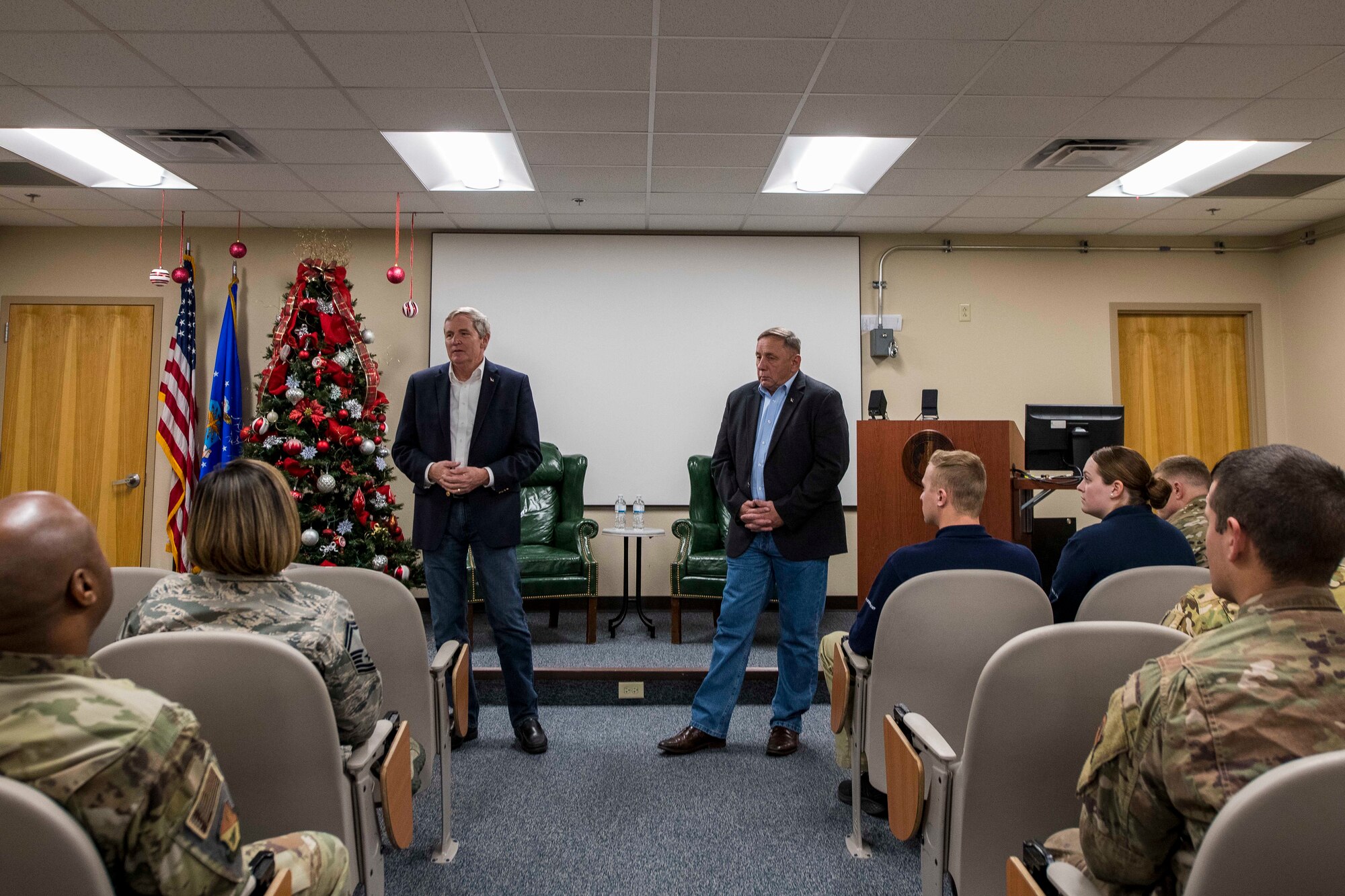 Retired Chief Master Sgts. of the Air Force Eric W. Benken and Jim Finch speak with enlisted members at Cannon Air Force Base, N.M., Dec. 5, 2019. The 12th and 13th Chief Master Sgts. of the Air Force visited Cannon to share their stories with Air Commandos. (U.S. Air Force photo Senior Airman Vernon R. Walter)