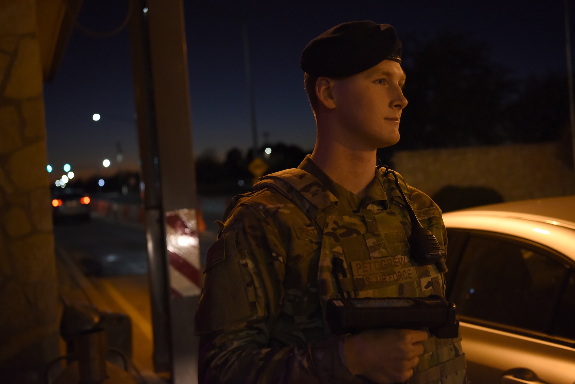 Security Forces Squadron member checks IDs at Arnold Gate