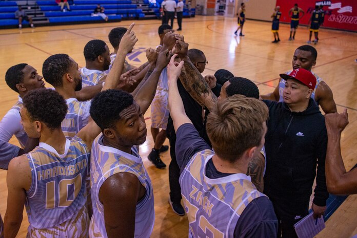 Nellis Lightning team put hands in for huddle