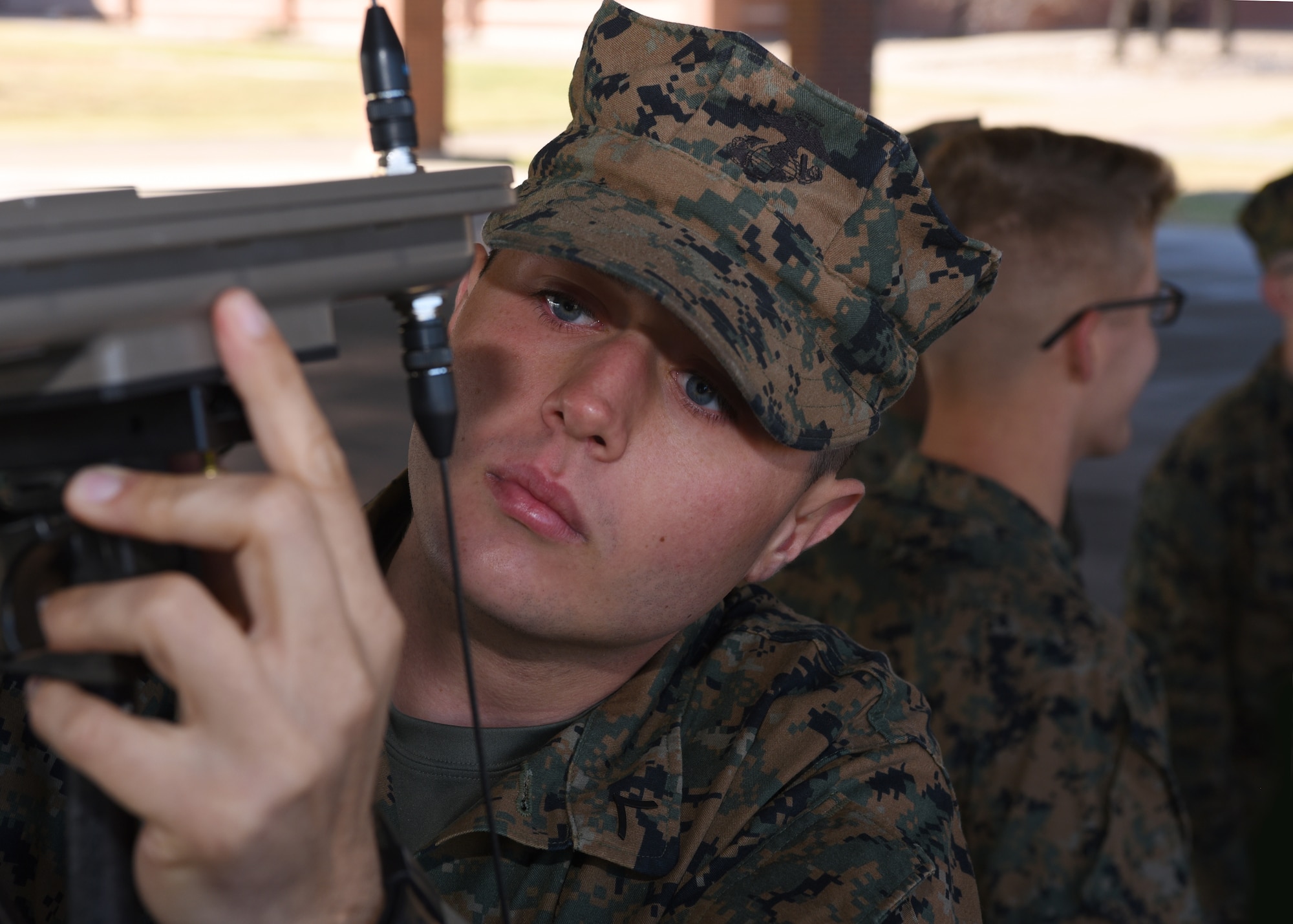 U.S. Marine Corps Pfc. William Stephens, Marine Corps Detachment tactical signals intelligence operator student, double checks that the antennas are installed correctly on versatile radio observation and direction finder in preparation for a field exercise outside of the MCD on Goodfellow Air Force Base, Texas, Dec. 6, 2019. The VROD equipment was used for intercepting and tracking radio waves of a mock adversary during the exercise. (U.S. Air Force Photo by Airman 1st Class Abbey Rieves)