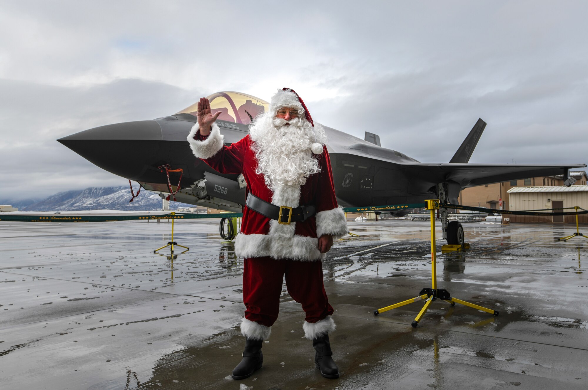 Santa poses for a picture in front of an F-35 Lightning II before visiting members of the 419th Fighter Wing Dec. 8 at Hill Air Force Base, Utah