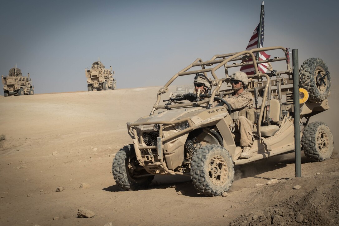 U.S. Marines with 3rd Battalion, 7th Marine Regiment, 1st Marine Division attached to Special Purpose Marine Air-Ground Task Force, Crisis Response-Central Command drive a Utility Task Vehicle around security positions at Fire Base Um Jorais July 4, 2018. Program Executive Officer Land System’s Light Tactical Vehicle program office is currently implementing several upgrades—including upgraded tires, clutch improvement kit and floorboard protection—to UTVs across the fleet. (U.S. Marine Corps Photo by Cpl. Carlos Lopez)