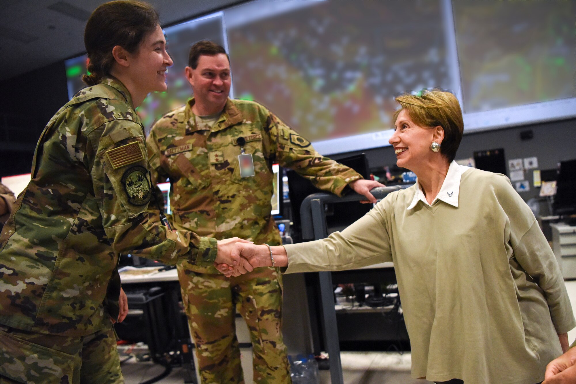 Secretary of the Air Force Barbara Barrett meets an Airman assigned to the Combined Air Coperations Center Nov. 11, 2019 at Al Udeid Air Base, Qatar.