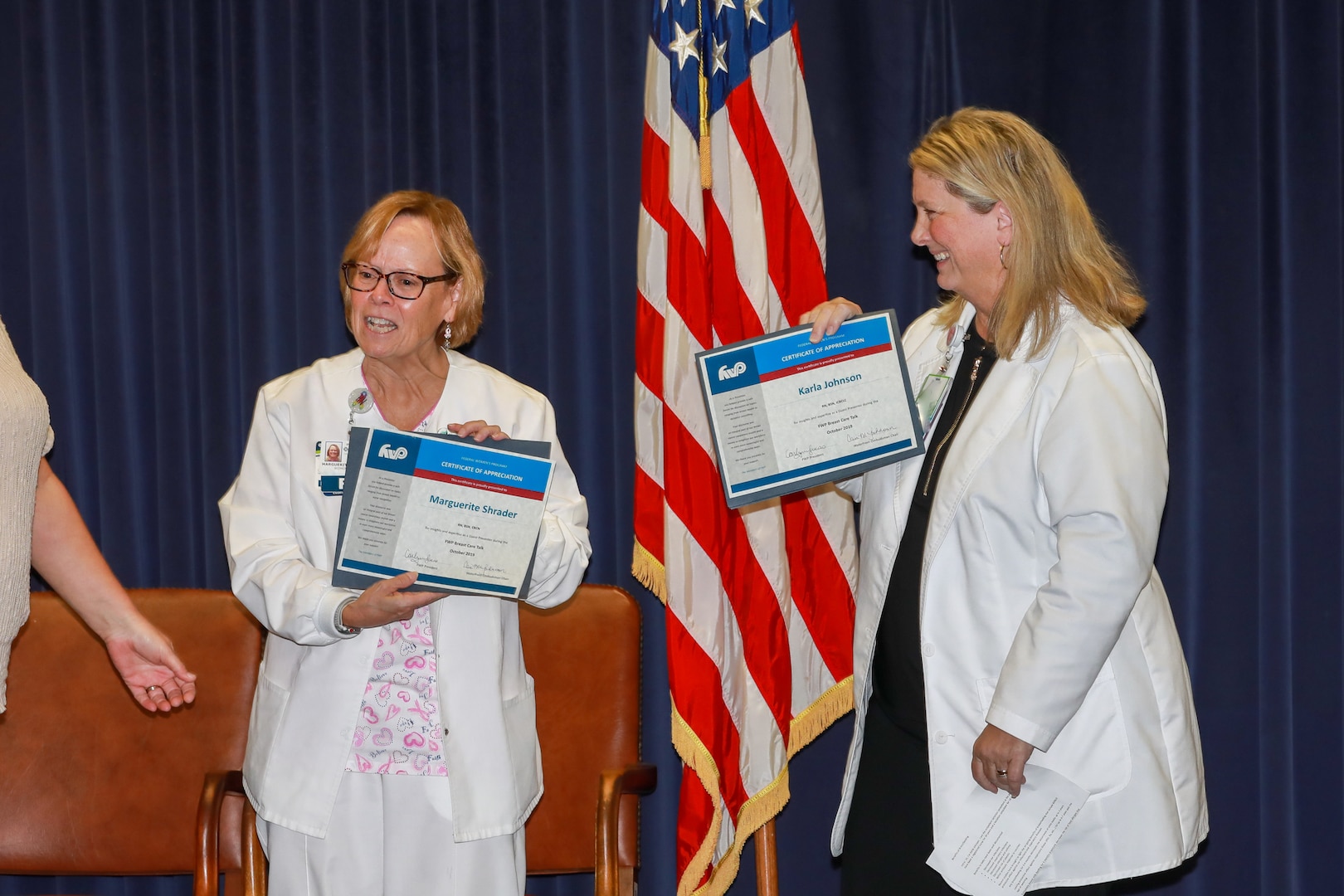 Certified Breast Care Nurse and Breast Health Navigator Marguerite “Meg” Shrader from Chesapeake Regional Breast Center (left), and Lactation Consultant Karla Johnson from Naval Medical Center Portsmouth (right) were awarded with a certificate of appreciation for their education efforts for the NNSY workforce by the Federal Women’s Program.