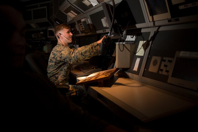 Cpl. Jacob Lenling sits in the radar room of the air traffic control tower aboard Marine Corps Air Station Beaufort, Dec. 4. Lenling is an air traffic controller with Headquarters and Headquarters Squadron. In honor of International Volunteer Day, Lenling is being recognized for having more than 431 volunteer hours.