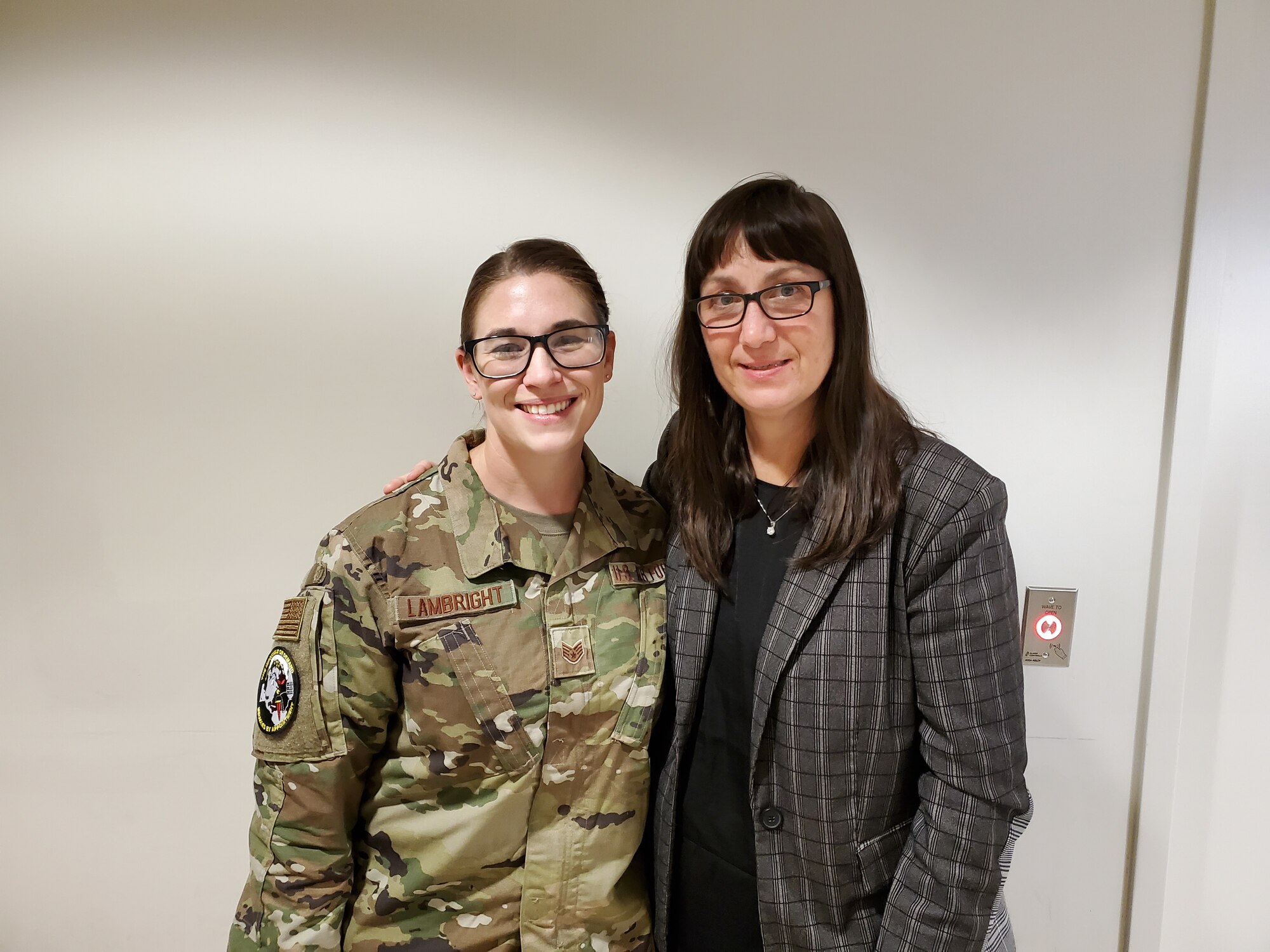 Staff Sgt. Chaya Lambright (left), a medical laboratory technician with the 711 Human Performance Wing, was recently recognized for assisting Bridget Kleismit (right) during a medical emergency at the Wright Field Fitness Center on Wright-Patterson Air Force Base.