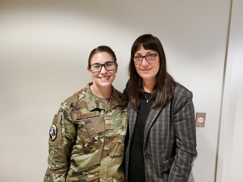 Staff Sgt. Chaya Lambright (left), a medical laboratory technician with the 711 Human Performance Wing, was recently recognized for assisting Bridget Kleismit (right) during a medical emergency at the Wright Field Fitness Center on Wright-Patterson Air Force Base.