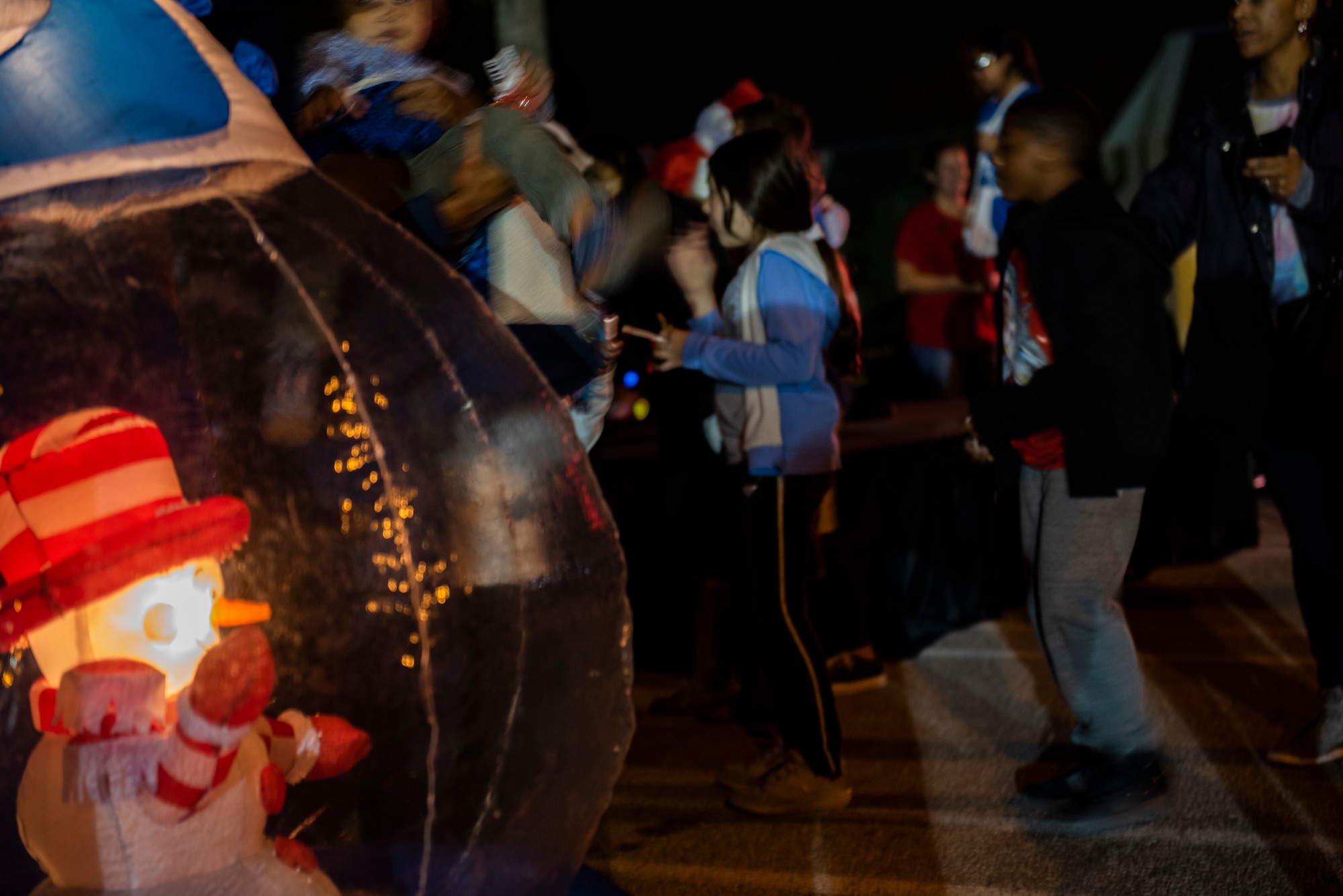 Children attend a holiday tree lighting ceremony hosted by the 325th Force Support Squadron at Tyndall Air Force Base, Florida, Dec. 6, 2019. The event was attended by service members, their spouses, dependents, local students, and retirees. The event also included carols sung by the Mosley High School Choir, crafts, and a visit from Santa Claus. (U.S. Air Force photo by Staff Sgt. Magen M. Reeves)