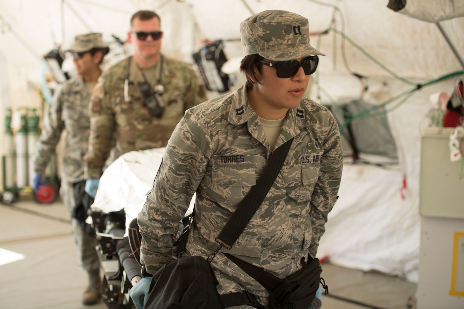 Capt. Gabriela Torres, a trauma nurse assigned to the 149th Medical Det-1, simulates providing medical treatment during the Texas National Guard's 6th CERFP Task Force response evaluation exercise Dec. 7, 2019, in Round Rock, Texas.