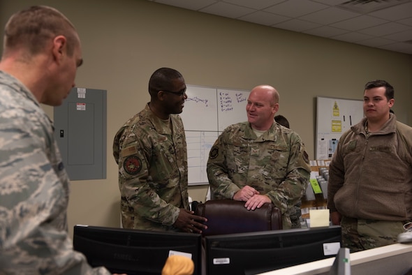 U.S. Air Force Chief Master Sgt. Wendell Snider, 366th Fighter Wing command chief speaks with Staff Sgt. Wesley Duke, 366th Logistics Readiness squadron NCO in change of ground transportation support, November 8, 2019, on Mountain Home Air Force Base, Idaho. Snider makes it his priority to get to know people from different units. (U.S. Air Force photo by Airman Natalie Rubenak)