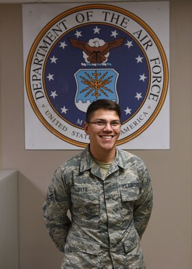 U.S. Air Force Airman 1st Class Alexander Otto, 316th Training Squadron signals intelligence analyst course graduate, poses for a photo in the Military Training Leader’s office at the 316th TRS dormitory on Goodfellow Air Force Base, Texas, Dec. 4, 2019. Otto worked as an office technician for the 316th TRS MTLs while waiting for his security clearance to be approved for his technical training. (U.S. Air Force photo by Airman 1st Class Abbey Rieves)