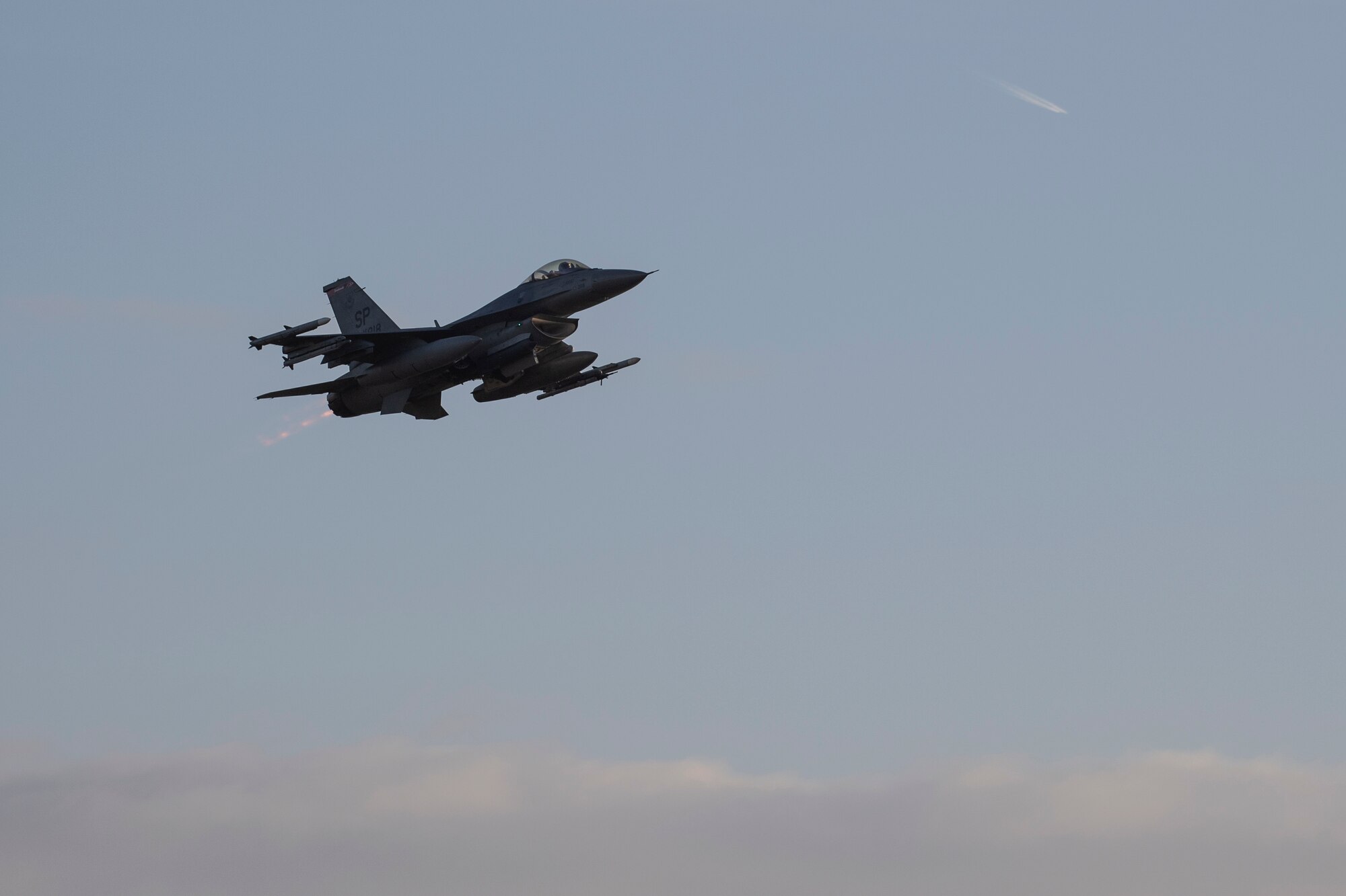 A U.S. Air Force F-16 Fighting Falcon, assigned to the 480th Fighter Squadron, takes off at Spangdahlem Air Base, Germany, Dec. 10, 2019. Spangdahlem F-16s participated in a multinational Allied Combat Lethality Exercise to strengthen U.S. Air Forces in Europe and NATO deterrence efforts. (U.S. Air Force photo by Airman 1st Class Valerie Seelye)