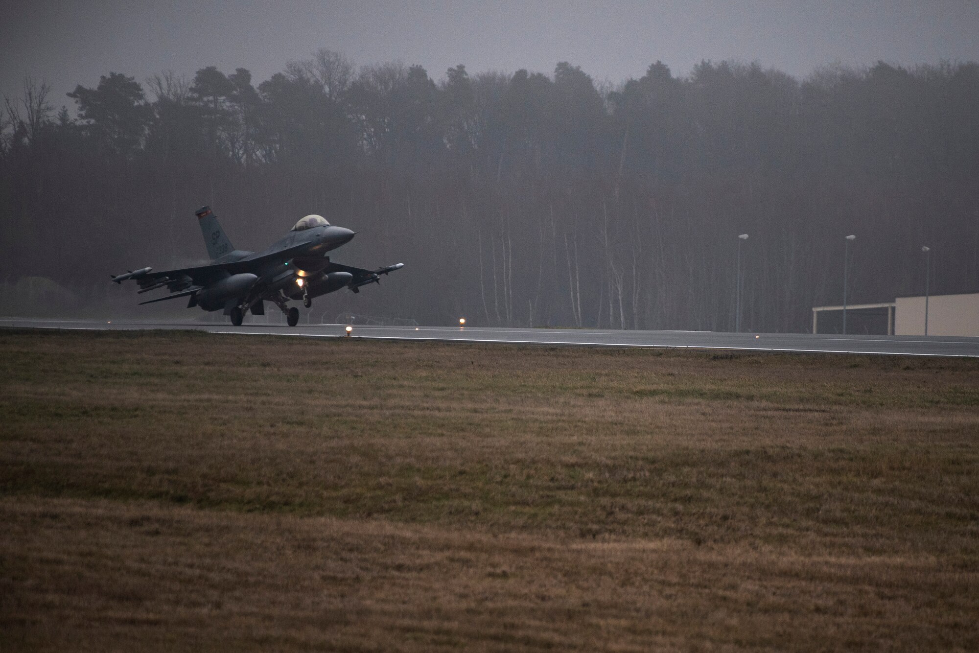 A U.S. Air Force F-16 Fighting Falcon, assigned to the 480th Fighter Squadron, lands at Spangdahlem Air Base, Germany, Dec. 10, 2019. Spangdahlem F-16s participated in an Allied Combat Lethality Exercise with the Polish air force to provide Airmen the opportunity to fly and train alongside NATO allies. Multinational exercises build and strengthen relationships between partner nations. (U.S. Air Force photo by Airman 1st Class Valerie Seelye)