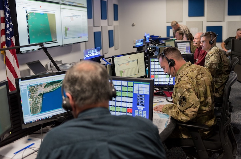 Members of the 45th Operations Group, Detachment 3, participate in an exercise on Nov. 20, 2019, in the Support Operations Center at Patrick Air Force Base, Fla. Det 3 is the only unit within the Department of Defense tasked to support contingency operations during Commercial Crew Program rocket launches, and is preparing for the planned return of human spaceflight within the next few months. (U.S. Air Force photo by Joshua Conti)
