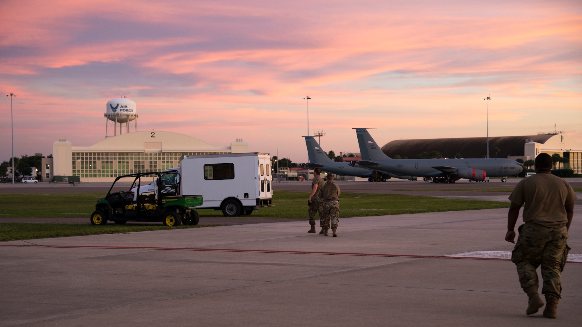 Sixth Maintenance Squadron (MXS) aircraft fuels system technicians walk on the flightline at MacDill Air Force Base, Fla., Nov. 25, 2019.