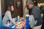 Charity organization representatives set up in the Bldg. 1500 lobby during the kickoff so employees could easily have a look at what they had to offer.