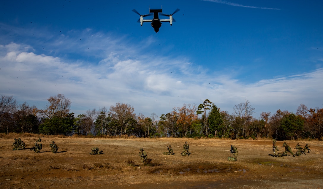 U.S. Marines with 1st Battalion, 25th Marine Regiment, currently assigned to 4th Marine Regiment, 3rd Marine Division, under the Unit Deployment Program, and Soldiers with 8th Infantry Regiment, Japan Ground Self-Defense Force, conduct an insert via MV-22B Osprey with Marine Medium Tiltrotor Squadron 262, during part of a comprehensive force on force event at Forest Light Middle Army in Aibano Training Area, Shiga, Japan, Dec. 10, 2019. Forest Light Middle Army is an annual training exercise that is designed to enhance the collective defense capabilities of the United States and Japan Alliance by allowing infantry units to maintain their lethality and proficiency in infantry and combined arms tactics.