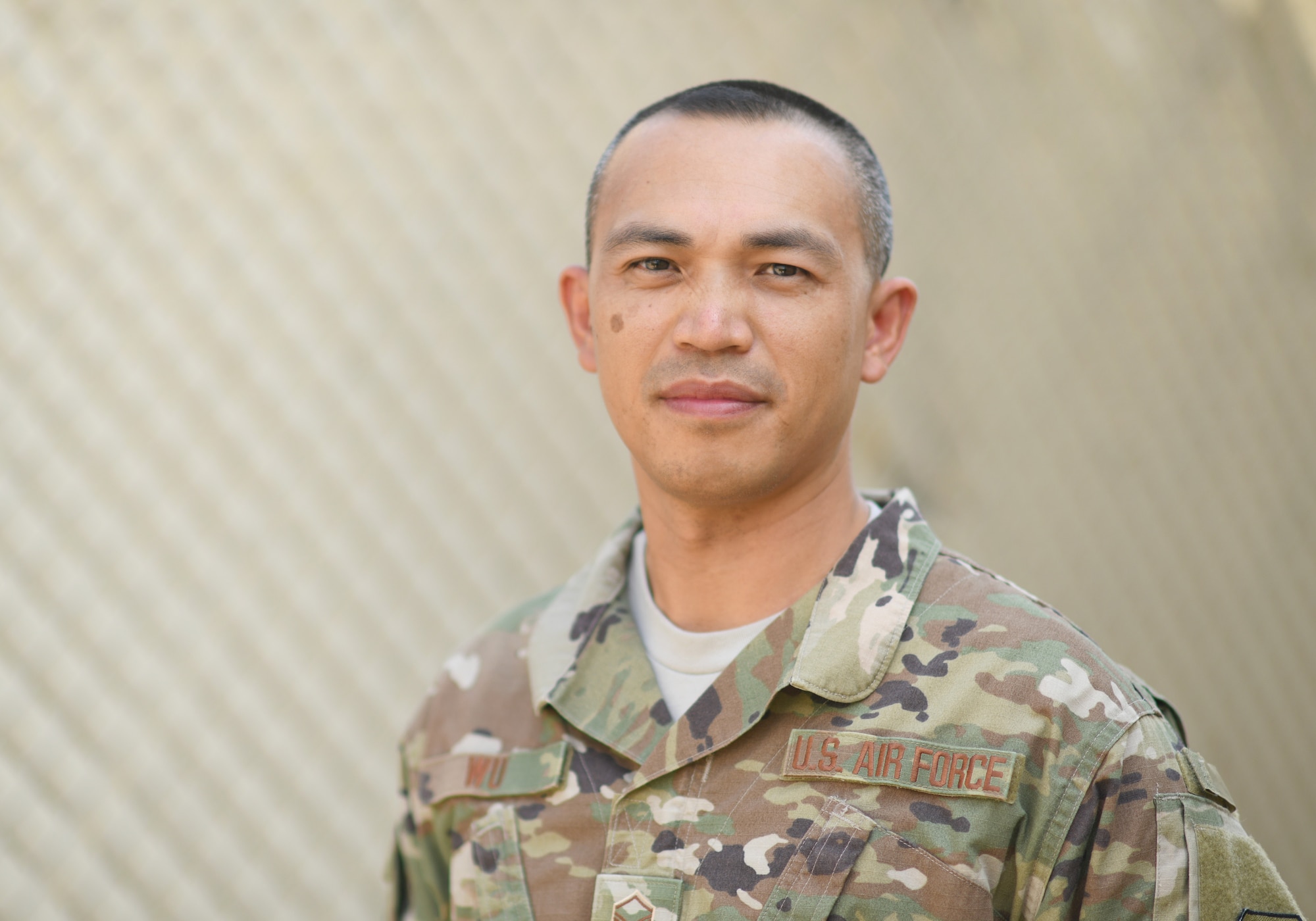 U.S. Air Force Master Sgt. Corey Wu, 726th Expeditionary Air Base Squadron disbursing agent, poses for a photo at Camp Lemonnier, Djibouti, Nov. 15, 2019. Last fiscal year, the 726th EABS Finance and Contracting Airmen executed more than $22 million, sustaining and building missions at three locations across East Africa. (U.S. Air Force photo by Staff Sgt. Alex Fox Echols III)