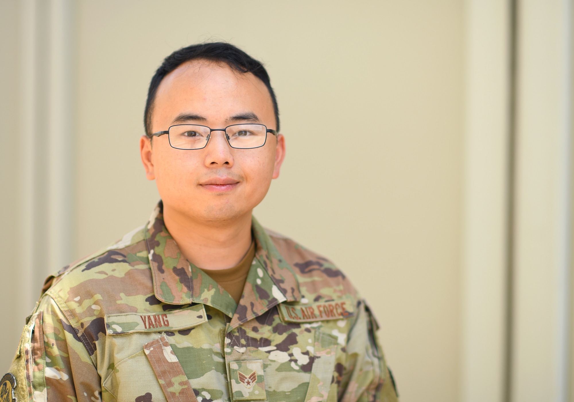U.S. Air Force Senior Airman Blia Yang, 726th Expeditionary Air Base Squadron contracting officer, poses for a photo at Camp Lemonnier, Djibouti, Nov. 15, 2019. Last fiscal year, the 726th EABS Finance and Contracting Airmen executed more than $22 million, sustaining and building missions at three locations across East Africa. (U.S. Air Force photo by Staff Sgt. Alex Fox Echols III)