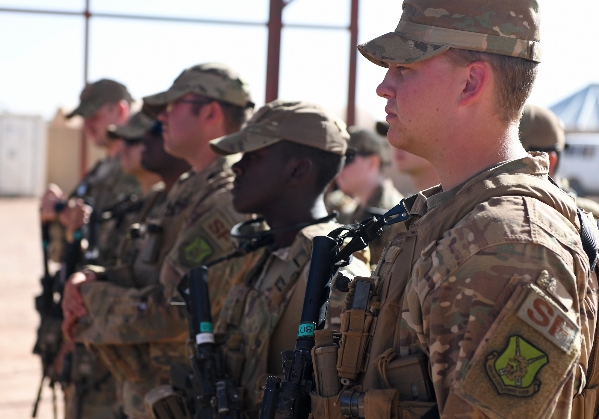 Members of the 409th Expeditionary Security Forces Squadron conduct their pre-shift guard mount at Nigerien Air Base 201 in Agadez, Niger, Dec. 9, 2019. The 409th ESFS vigilantly defend the base and its assets through constant patrols, vehicle inspections and the vetting of all personnel working on the installation. (U.S. Air Force photo by Staff Sgt. Alex Fox Echols III)