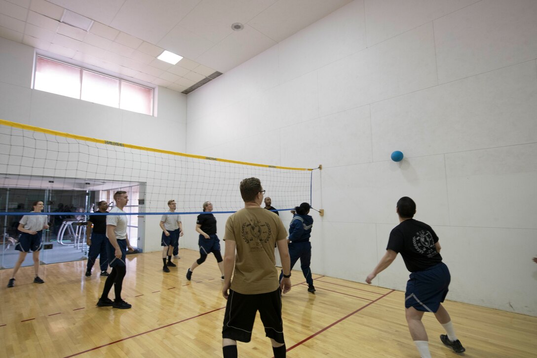 Members of the 27th Special Operations Logistics Readiness Squadron play a game of “walleyball” during the Individuals Caring Attitude Resiliency and Empowerment event at Cannon Air Force Base, N.M., Dec. 6, 2019. The event allowed volunteers to take a proactive approach on how to handle mental health issues for their wingmen and themselves. (U.S. Air Force photo by Senior Airman Vernon R. Walter III)