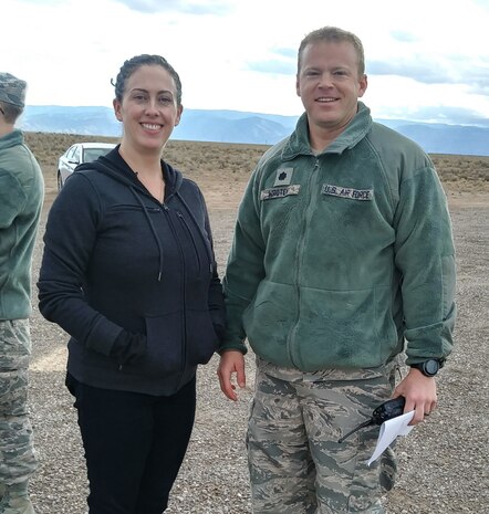 Senator Tom Udall’s Field Representative, Elizabeth Driggers and Lt Col Matthew Wroten, 846th Test Squadron Commander, pose for a photo Nov. 22, 2019, on Holloman Air Force Base, N.M. Driggers's trip to the Test Group focused on familiarization and orientation of activities and capabilities. (U.S. Air Force photo by Dwight Harp)