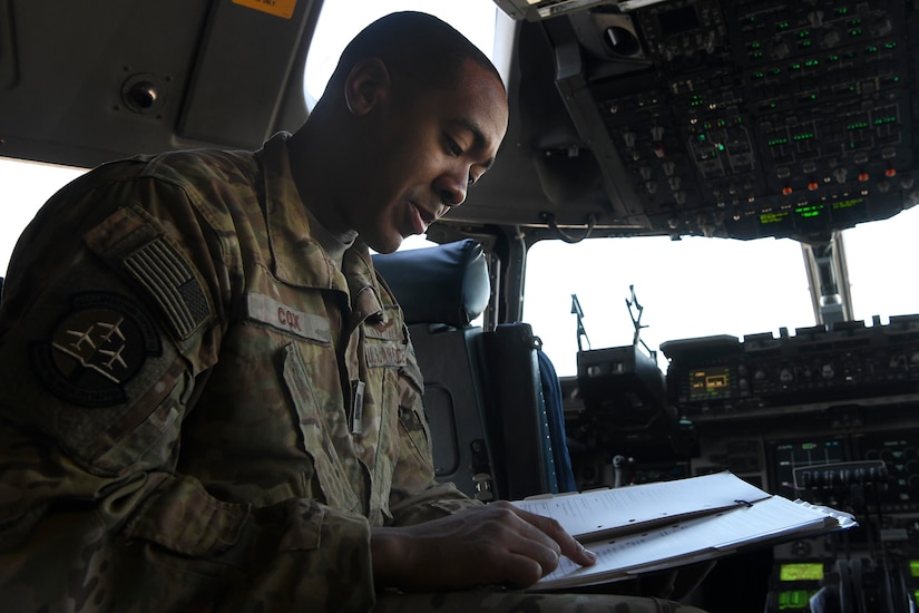 Capt. Nicholas Cox, a pilot instructor, assigned to the 16th Airlift Squadron at Joint Base Charleston, S.C., conducts pre-flight checks at Pope Army Airfield N.C., December 7, 2019. The 16th AS staged at Pope to load the 82nd Airborne assigned to Fort Bragg, N.C.. The 437th Airlift Wing supported Joint Forcible Entry 19B by sending a three-ship to the Nevada Testing and Training Range to conduct personnel airdrop operations with the 82nd Airborne, three other C-17 Globemaster III’s, and 17 C-130J Hercules. (Photo by Staff Sergeant Lance Valencia)