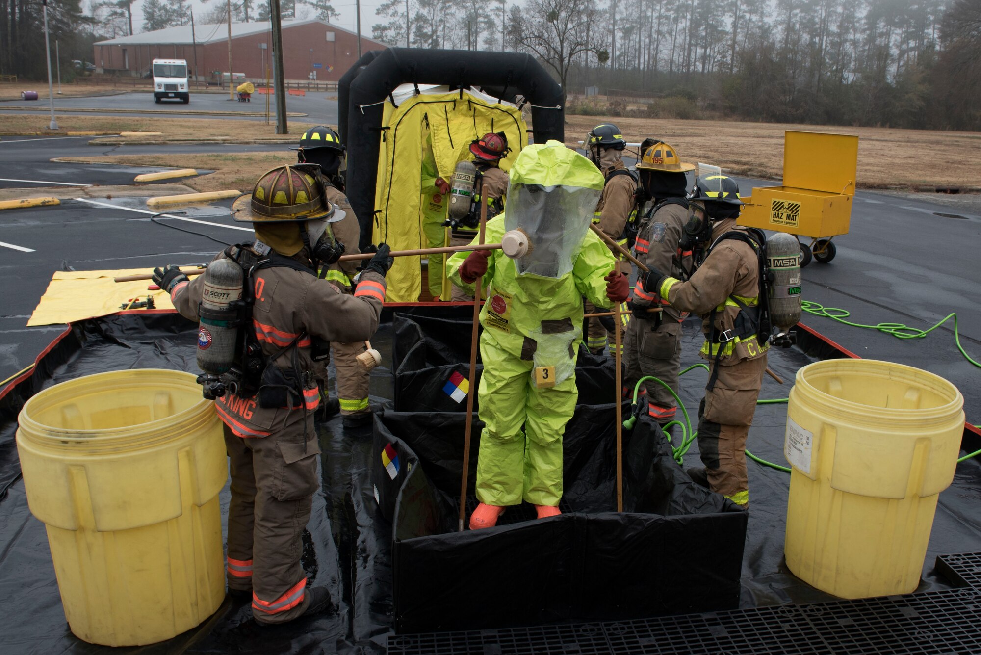 Members of the 4th Fighter Wing and the Goldsboro Fire Department, conduct decontamination procedures during a Hazardous Material Spill Response exercise, Dec. 9, 2019, in Goldsboro, N.C.