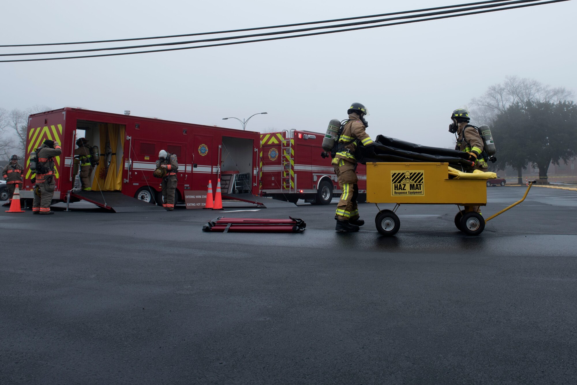 Members of the 4th Civil Engineer Squadron fire department and the Goldsboro Fire Department, set-up a decontamination station during a Hazardous Material Spill Response exercise, Dec. 9, 2019, in Goldsboro, N.C.