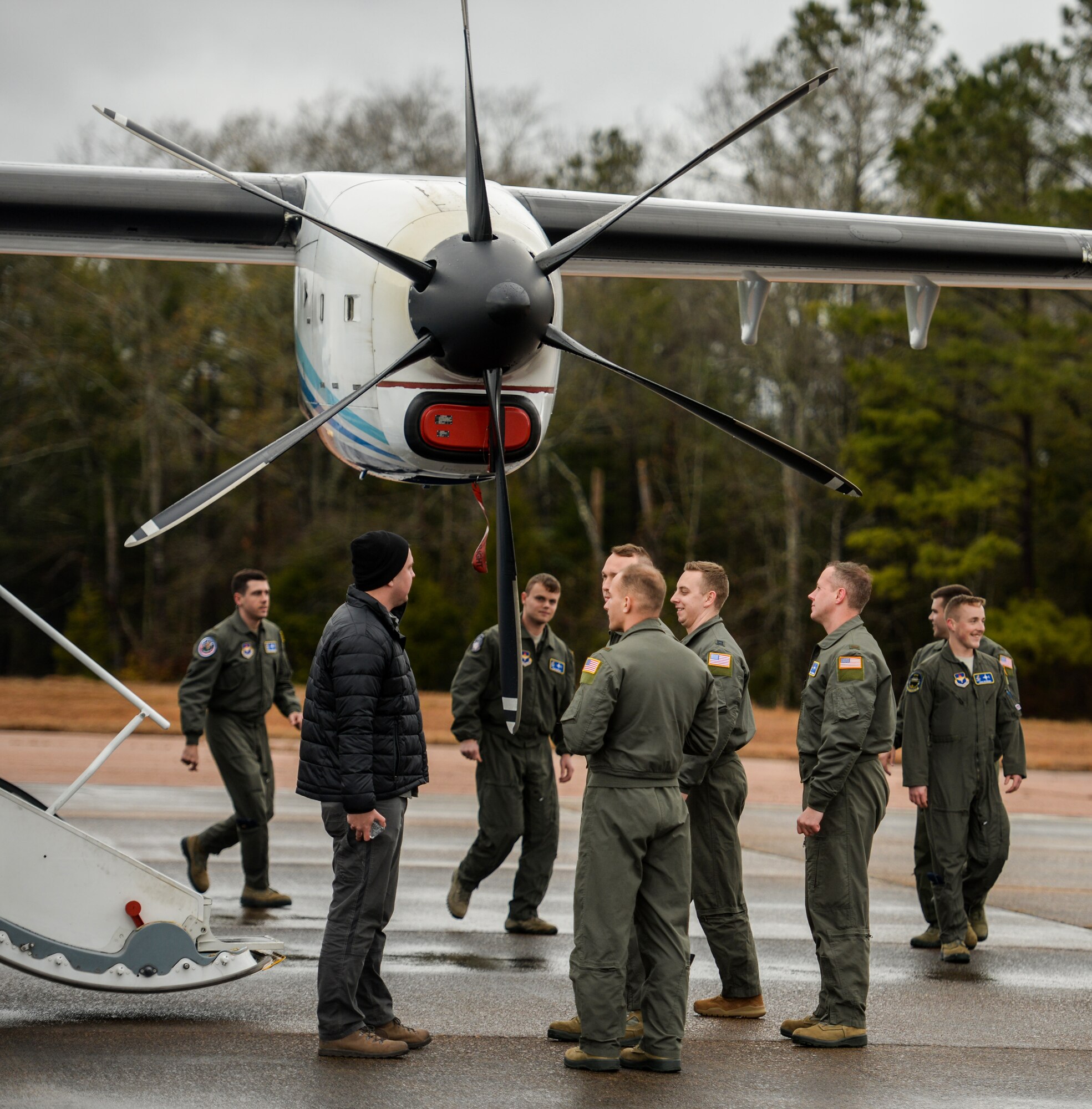 Airmen discuss the capabilities of the C-146 Wolfhound Dec. 10, 2019, at Columbus Air Force Base, Miss. The C-146A Wolfhound’s primary mission is to provide U.S. Special Operations Command flexible, responsive and operational movement of small teams needed in support of Theater Special Operations Commands. (U.S. Air Force photo by Airman Davis Donaldson)