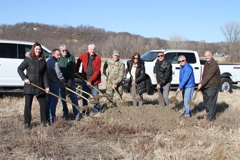 Leaders who helped bring the Parkville Bottoms Project to fruition on the banks of the Missouri River in Parkville, Mo. break the ground on construction December 11, 2019. The project will have over 40 acres of restored wetland on over 100 acres of land with walking trails traversing it.
