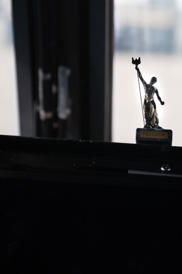 Poseidon statue on the counsel of an LCAC.