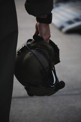 Someone standing with an LCAC Helmet.