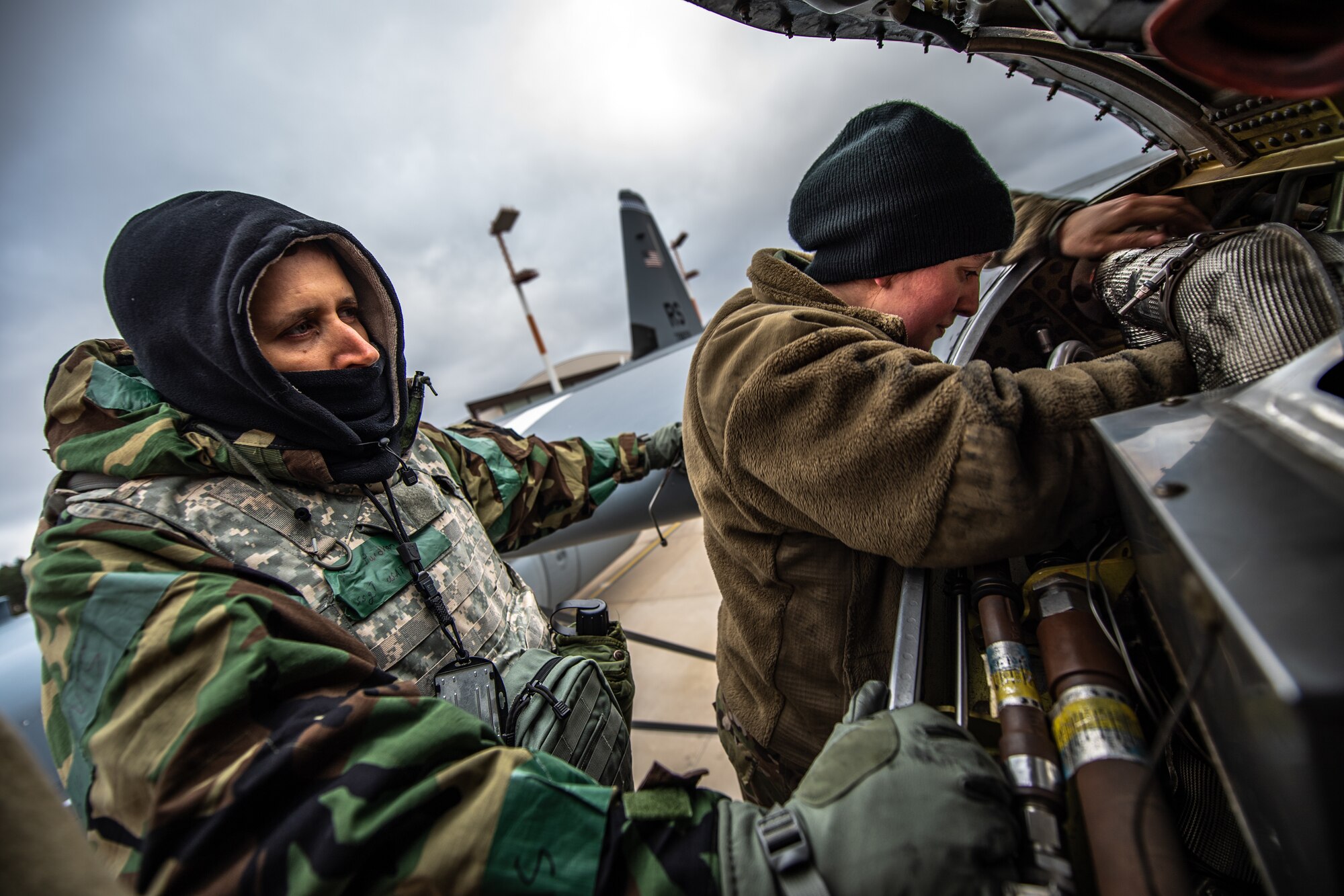 U.S. Air Force Staff Sgt. Ross Purdham and Staff Sgt. Rachel Revels, 86th Aircraft Maintenance Squadron engine specialists, perform maintenance on a C-130J Super Hercules during exercise Operation Varsity 19-04 at Ramstein Air Base, Germany, Dec. 10, 2019. The exercise tested the maintainers’ abilities to operate under unpredictable circumstances. (U.S. Air Force photo by Staff Sgt. Devin Boyer)
