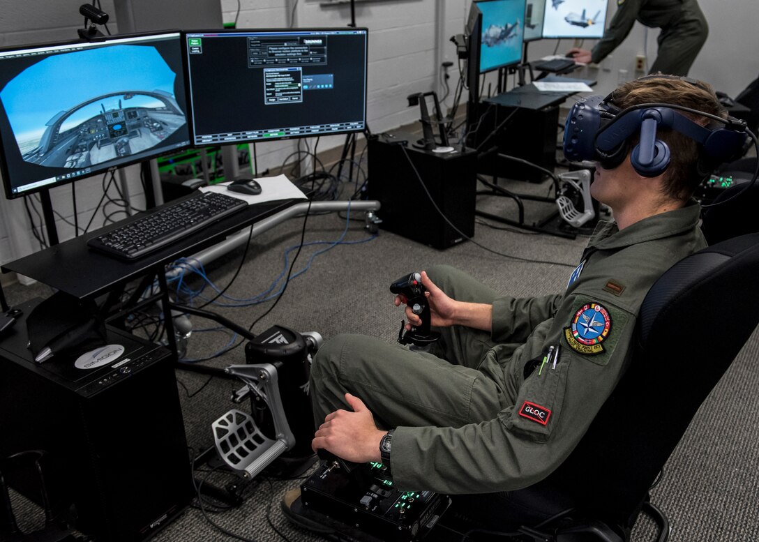 An Euro-NATO Joint Jet Pilot Training Program student pilots uses a virtual reality station at Sheppard Air Force Base, Texas, Dec. 10, 2019. The ENJJPT program allows student pilots access to the Spark Cell at Sheppard. The Spark Cell incorporates virtual and augmented reality into the student pilots training. They are allowed to check out headsets or schedule time to use the stations to continue their training without having to get into an actual plane. (U.S. Air Force photo by Senior Airman Pedro Tenorio)