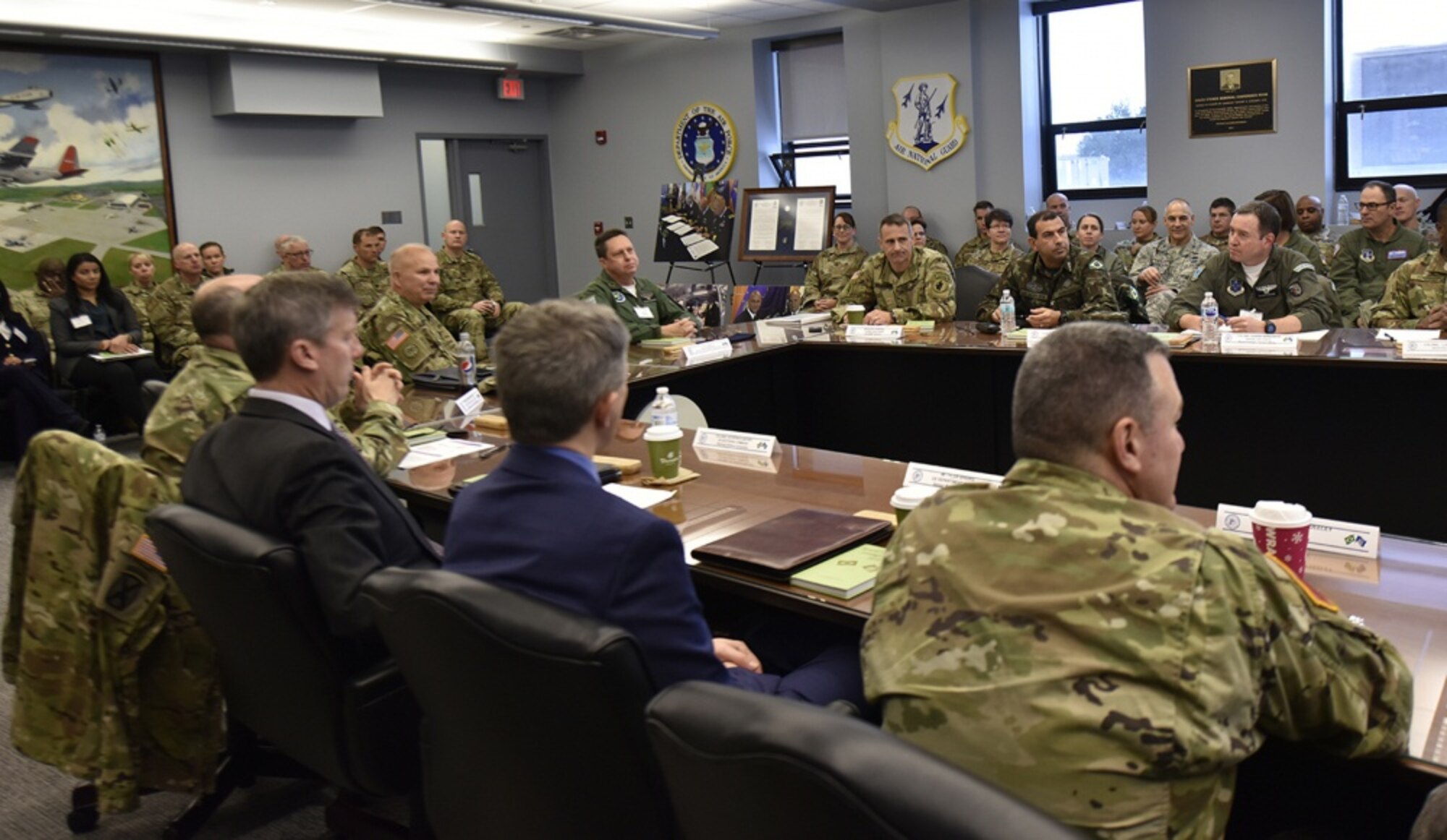 New York Army National Guard Maj. Gen. Ray Shields (center right), the adjutant general of New York, and Brazilian Maj. Gen. Marcio de Calazans Braga (center right), the Brazilian military attache in Washington, D.C., meet with members of the New York Air and Army National Guard and U.S. Southern Command and State Department representatives Dec. 11, 2019, at Stratton Air National Guard Base in Scotia, N.Y. The two-day meeting was held to discuss training and exchange opportunities as part of the National Guard State Partnership Program. (U.S. Air National Guard photo by Senior Master Sgt. William Gizara)
