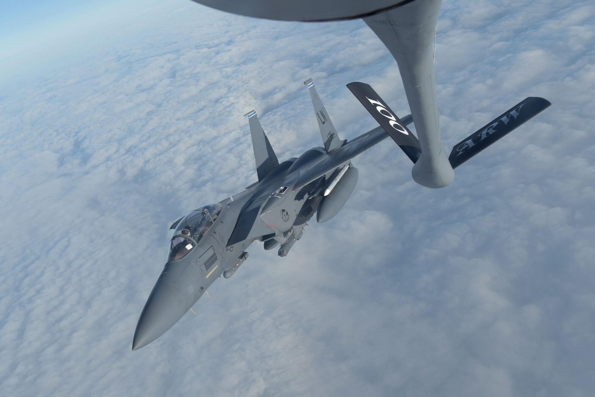 A U.S. Air Force F-15E Strike Eagle assigned to the 492nd Fighter Squadron, RAF Lakenheath, England, peels away after receiving fuel from a 100th Air Refueling Wing KC-135 Stratotanker during the Allied Combat Lethality Exercise over Poland, Dec. 10, 2019. Participation in multinational exercises enhance professional relationships and improves overall coordination with allies and partner militaries during times of crisis. (U.S. Air Force photo by Senior Airman Benjamin Cooper)