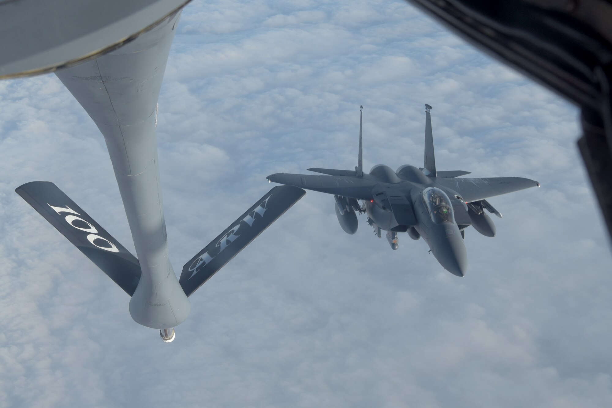 A U.S. Air Force F-15E Strike Eagle assigned to the 492nd Fighter Squadron, RAF Lakenheath, England, prepares to receive fuel from a 100th Air Refueling Wing KC-135 Stratotanker during the Allied Combat Lethality Exercise over Poland, Dec. 10, 2019. These exercises allow United States Air Forces in Europe – Air Forces Africa to enhance interoperability between the U.S. Air Force and NATO allies and partners. (U.S. Air Force photo by Senior Airman Benjamin Cooper)