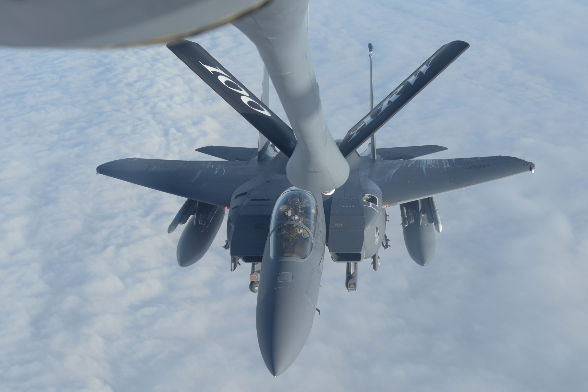 A U.S. Air Force F-15E Strike Eagle assigned to the 492nd Fighter Squadron, RAF Lakenheath, England, moves into position to receive fuel from a 100th Air Refueling Wing KC-135 Stratotanker during the Allied Combat Lethality Exercise over Poland, Dec. 10, 2019. Exercises like these are opportunities to provide Airmen the opportunity to fly and train alongside NATO allies and partners. (U.S. Air Force photo by Senior Airman Benjamin Cooper)