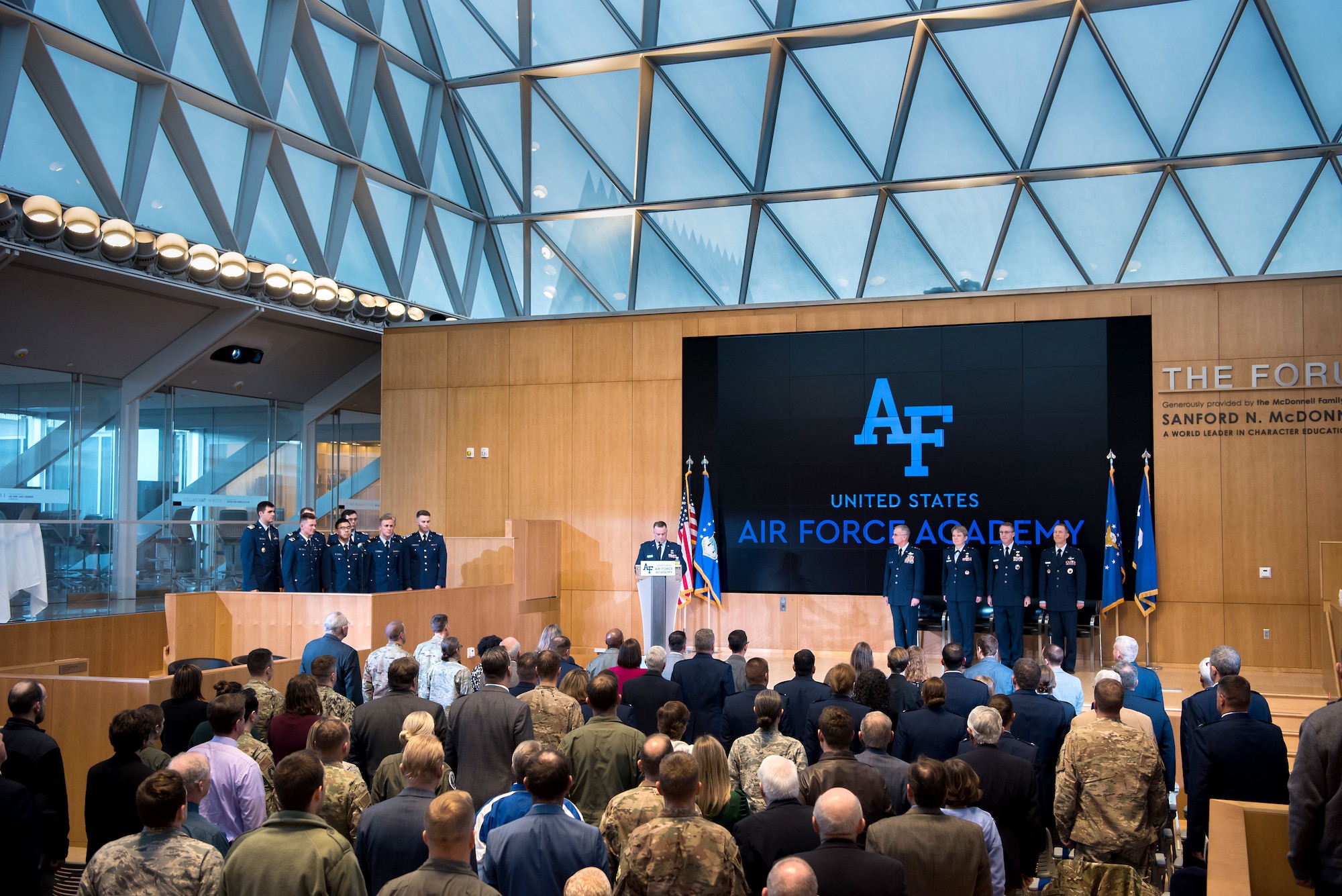 Academy superintendent, Lt. Gen. Jay Silveria, formally invested Col. Richard Cooney, department of behavioral sciences and leadership, and Col. Douglas Wickert, department of aeronautics, during an investiture ceremony in Polaris Hall at the U.S. Air Force Academy, Colo., Dec. 6, 2019. The Senate confirms the president’s nomination for each of the permanent professor positions which is a final stop in an Air Force career. (U.S. Air Force photo by Trevor Cokley)
