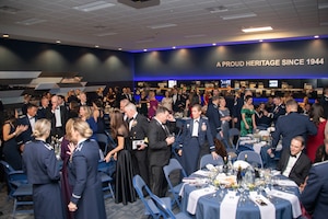 Guests mingle during the 1st Helicopter Squadron's 50th anniversary gala at Joint Base Andrews, Md., Dec. 6, 2019.