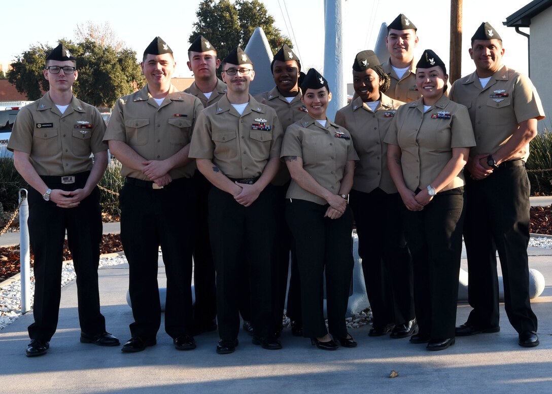 U.S. Navy Analysis and Reporting course graduates pose for a photo outside of the Center for Information Warfare Training Detachment on Goodfellow Air Force Base, Texas, Dec. 12, 2019. The CIWTD graduates attended the course through the 316th Training Squadron. (U.S. Air Force photo by Airman 1st Class Abbey Rieves)