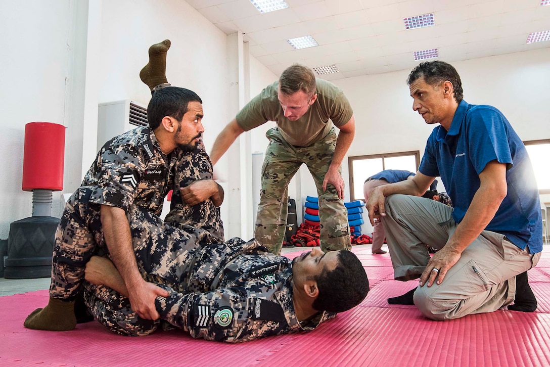 Soldiers conduct self-defense training.