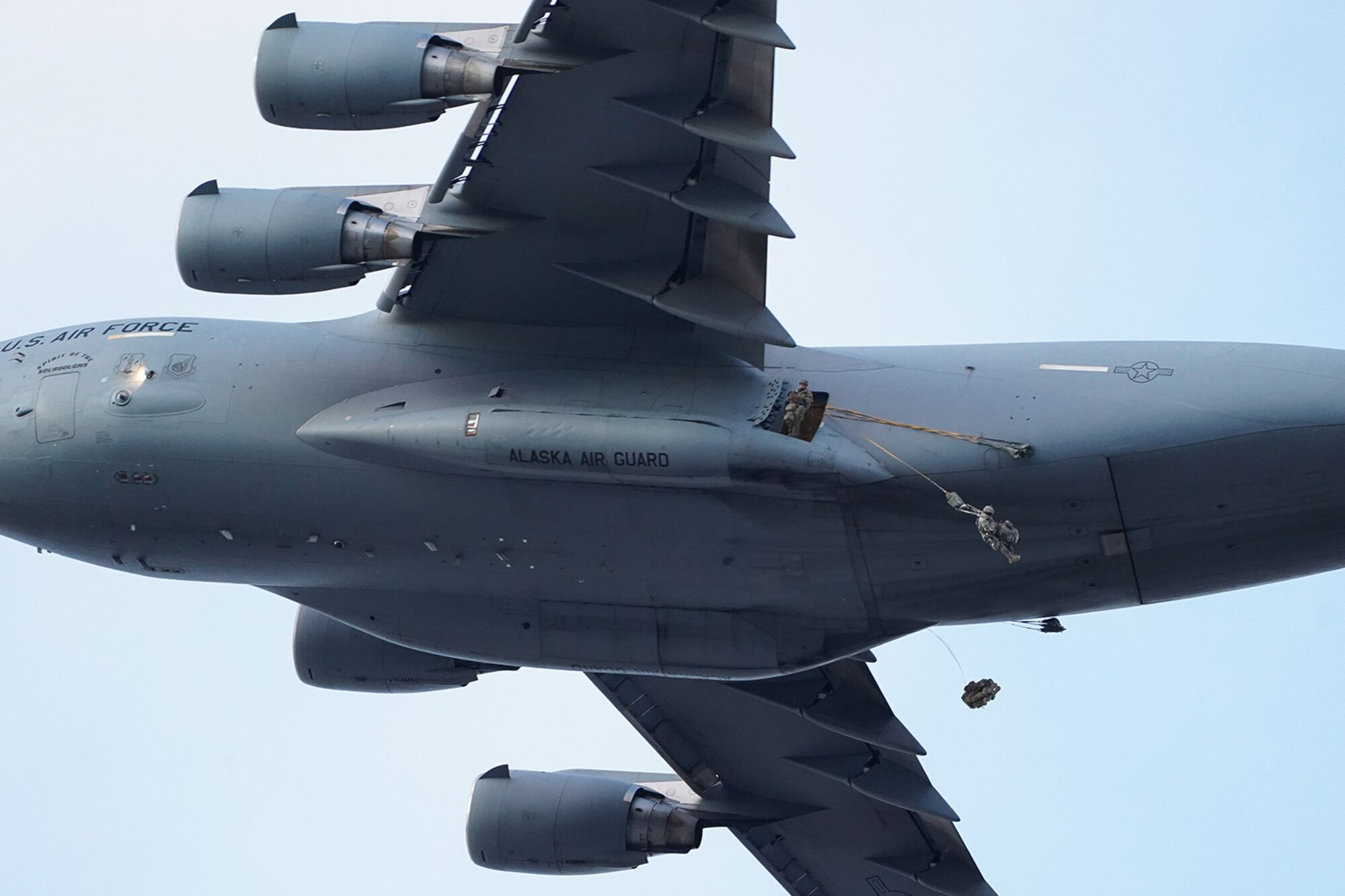 Paratroopers assigned to the 4th Infantry Brigade Combat Team (Airborne), 25th Infantry Division, U.S. Army Alaska, conduct a parachute jump on Malemute drop zone at Joint Base Elmendorf-Richardson, Alaska, Dec. 11, 2019. The Soldiers are part of the Army’s only Pacific airborne brigade with the ability to rapidly deploy worldwide, and are trained to conduct military operations in austere conditions.