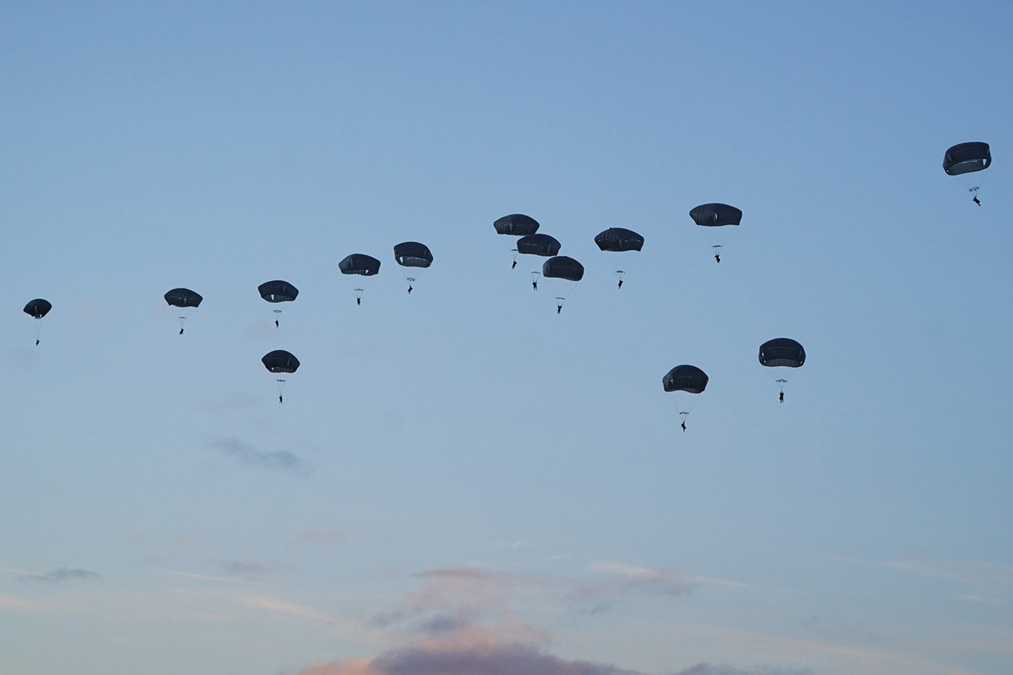 Paratroopers assigned to the 4th Infantry Brigade Combat Team (Airborne), 25th Infantry Division, U.S. Army Alaska, conduct a parachute jump on Malemute drop zone at Joint Base Elmendorf-Richardson, Alaska, Dec. 11, 2019. The Soldiers are part of the Army’s only Pacific airborne brigade with the ability to rapidly deploy worldwide, and are trained to conduct military operations in austere conditions.